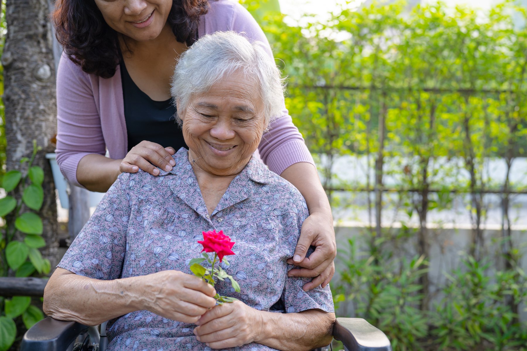 Caregiver Daughter Hug and Help  Asian Senior or Elderly Old Lad